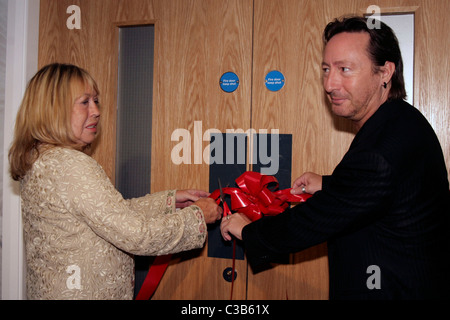 Julian Lennon and Cynthia Lennon attend the opening of 'White Feather: The Spirit of Lennon' at the Liverpool Beatles Story at Stock Photo