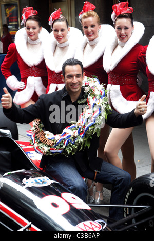 The winner of the 2009 Indianapolis 500, Helio Castroneves and the Rockettes attend the post-race victory tour at Radio City Stock Photo