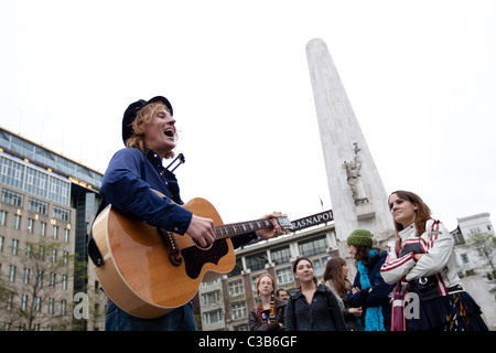 A musician entertains the crowd at Dam Square in Amsterdam Stock Photo