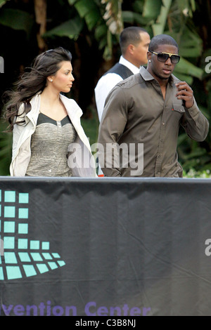 Kim Kardashian and Reggie Bush Celebrities arrive to watch the Los Angeles Lakers game against the Denver Nuggets at the Stock Photo