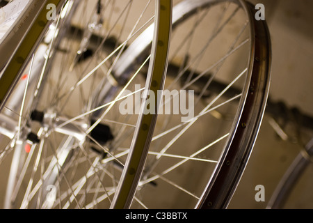 Tools, parts and bikes - backstage in a bicycle workshop Stock Photo
