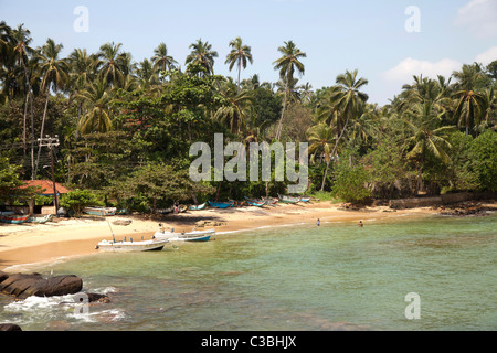 beach with fishing boats near Dondra Head on the southern tip of the island Sri Lanka Stock Photo