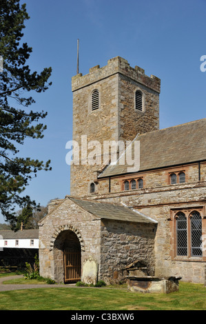 West tower and South porch, Church of Saint Kentigern. Caldbeck, Cumbria, England, United Kingdom, Europe. Stock Photo