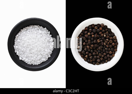 Rock Salt and black Peppercorns Stock Photo