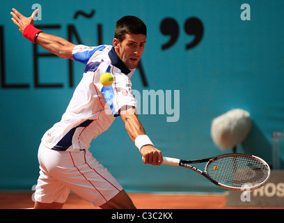 05.05.2011 - Novak Djokovic (SRB) in action against Guillermo García-López (ESP), 3rd Round of the Mutua Madrilena Madrid Open, Stock Photo