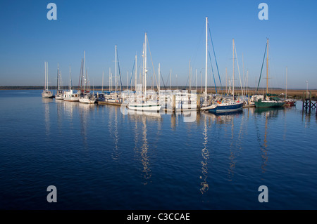 Georgia, St. Marys. Waterfront area along the St. Marys River. Sailboats on the St. Mary river. Stock Photo