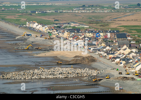 Contractors strengthening the sea defences at Borth on the Cardigan Bay coast of west Wales UK Stock Photo