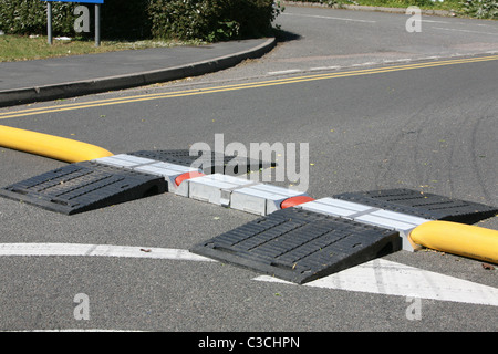 ramps put in place by firefighters to protect there hoses from traffic Stock Photo