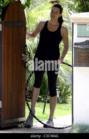 Liv Tyler waving goodbye to a friend outside her house while holding a hula hoop Los Angeles, California - 17.06.09 BJJ / Stock Photo