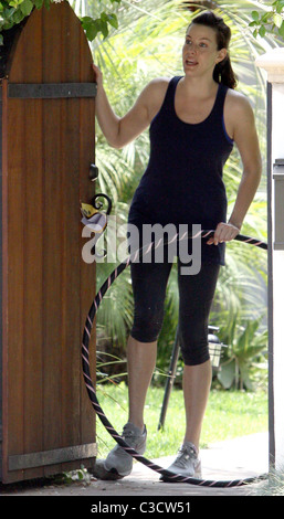 Liv Tyler waving goodbye to a friend outside her house while holding a hula hoop Los Angeles, California - 17.06.09 BJJ / Stock Photo