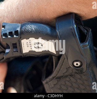 A Taser weapon in a holster Stock Photo