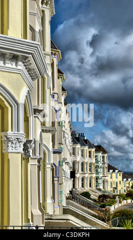 HDR row traditional UK British houses with Cloudy sky. Vertical composition Stock Photo