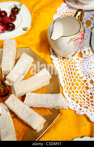 Traditional English cream tea picnic served on vintage crockery Stock Photo