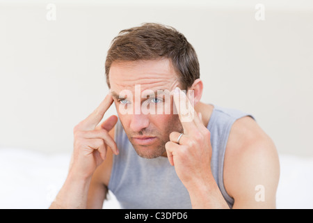Man suffering from headache Stock Photo