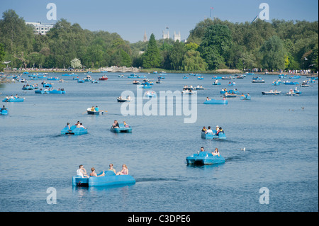 Pleasure boats on the Serpentine in Hyde Park, London, England, UK. Stock Photo