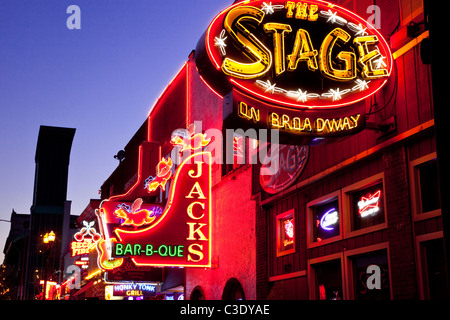 Neon signs and historic music clubs along Lower Broadway in Nashville Tennessee USA Stock Photo