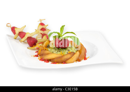 A fruit based dessert photographed in the studio on a white background. Dessert à base de fruits photographié en studio. Stock Photo