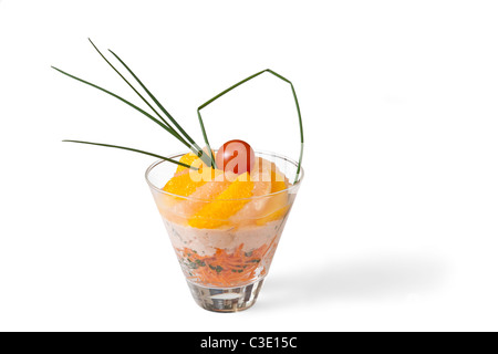 Citrus fruit and grated carrot based hors d'oeuvre, photographed in the studio. Hors-d'œuvre à base d'agrumes et de carottes. Stock Photo