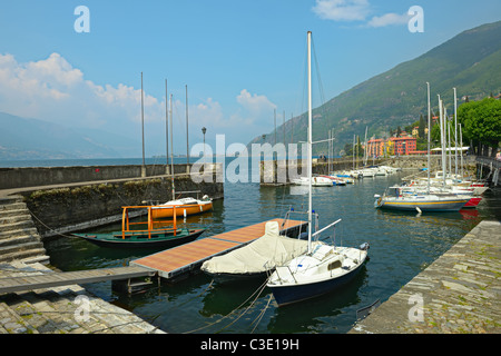 Saling boats moored in Bellano harbour on the lake front, Lake Como, Lombardy, Italy, Europe Stock Photo
