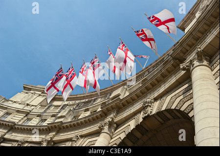 White Ensign flags flying on Admiralty Arch, London, England, UK Stock Photo