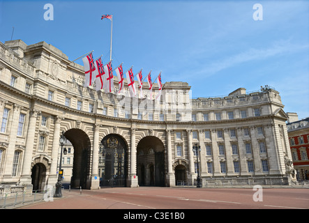 Admiralty Arch, The Mall, London, England, UK, decorated with White Ensigns Stock Photo