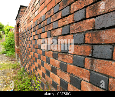 Black and red brick wall Stock Photo
