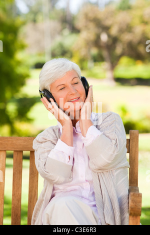 Senior woman listening to some music Stock Photo