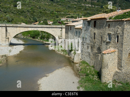 Roman bridge or Pont Vieux of Lagrasse in the Corbières mountains of the departement Aude in Languedoc-Roussillon Stock Photo