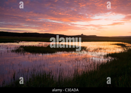 Sunset reflected in Bunduff Lough, Mullaghmore, County Sligo, Ireland. Stock Photo