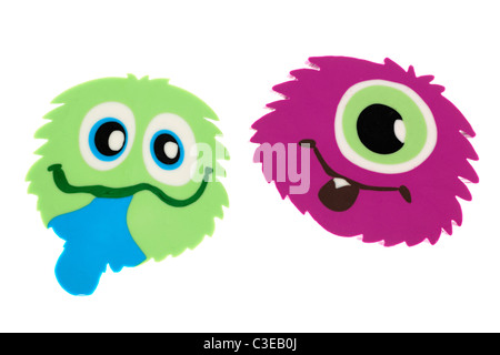 Two kiddies erasers in the shape of funny faces Stock Photo