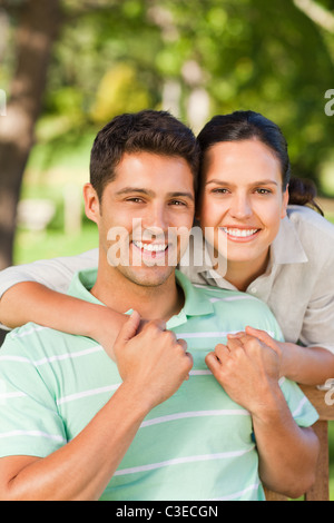 Woman huging her boyfriend Stock Photo