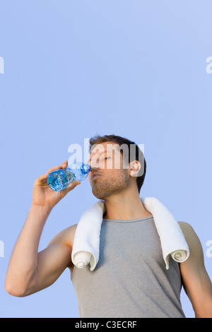 Man drinking water after the gym Stock Photo