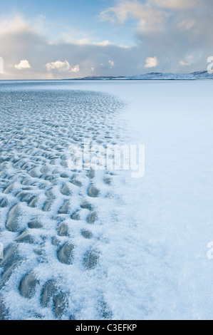 Luskentyre beach with dusting of snow, Isle of Harris, Outer Hebrides, Scotland Stock Photo