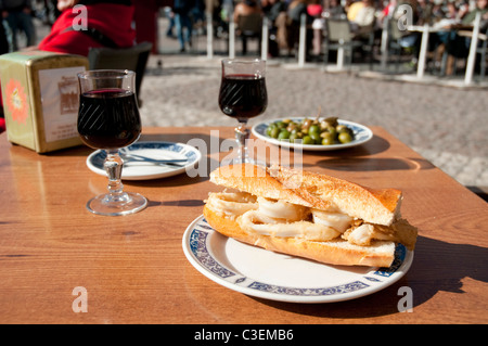 Fried squids sandwich at Plaza Mayor. Madrid, Spain. Stock Photo