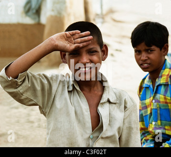 Portrait of a boy saluting, Agra, Uttar Pradesh, India Stock Photo