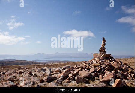 Stack of stones summit of the Bealach na Bà Stock Photo