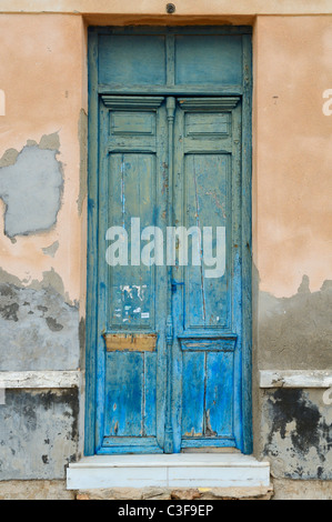 A weathered door in the Spanish Mediterranean town of Torrevieja, Spain, Alicante. Stock Photo