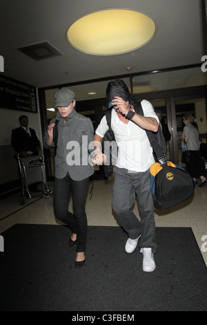 Ryan Phillippe and Abby Cornish  arrive at LAX on a flight from Toronto, surrounded by photographers. Los Angeles, California - Stock Photo