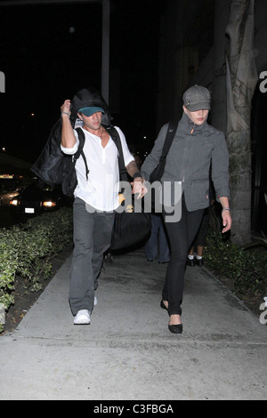 Ryan Phillippe and Abby Cornish  arrive at LAX on a flight from Toronto, surrounded by photographers. Los Angeles, California - Stock Photo