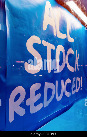 All Stock must go! Sign in shop window, Baker Street, London, England, UK, Europe Stock Photo