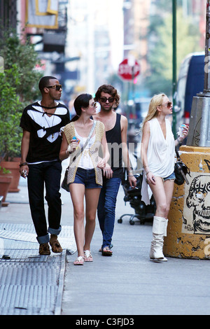 Lindsay Lohan out shopping in SoHo wearing very short shorts and white knee-high boots. Lindsay was out with her sister Ali Stock Photo