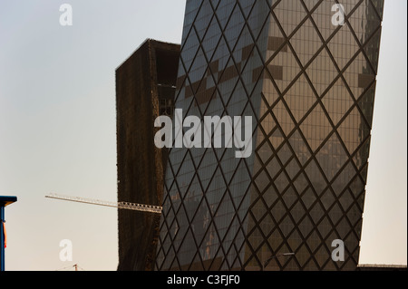 The burnt and the rebuilt CCTV TV station HQ by OMA Rem Koolhaas architecture studio, 2009, CBD, Beijing, China, Asia. Stock Photo
