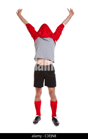 Photo of a footballer or soccer player cut out on a white background,. Stock Photo