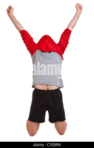 Photo of a footballer or soccer player cut out on a white background,. Stock Photo