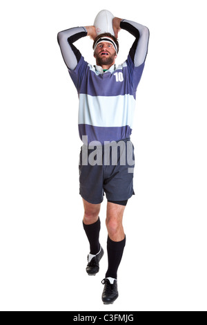 Photo of a rugby player throwing the ball for a line out, cut out on a white background.