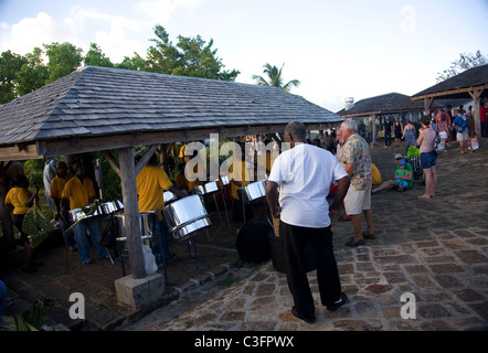 Crowds watch steel drum band on Shirley heights in Antigua