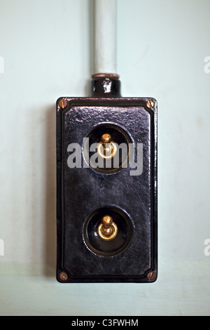 A double light switch in a classroom in the Scotland Street school designed by Charles Rennie Mackintosh, Glasgow, Scotland, UK Stock Photo