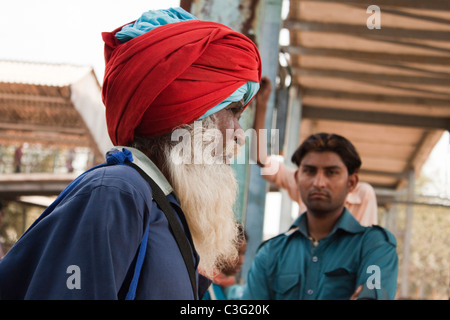 People at a railway station, Ahmedabad, Gujarat, India Stock Photo