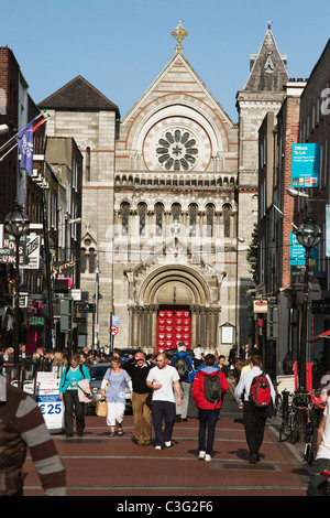 People in front of a church in market, St. Ann's Church, Dublin, Republic of Ireland Stock Photo