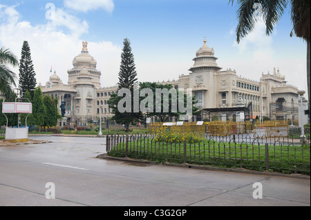 Government building on roadside, Vidhana Soudha, Bangalore, Karnataka, India Stock Photo